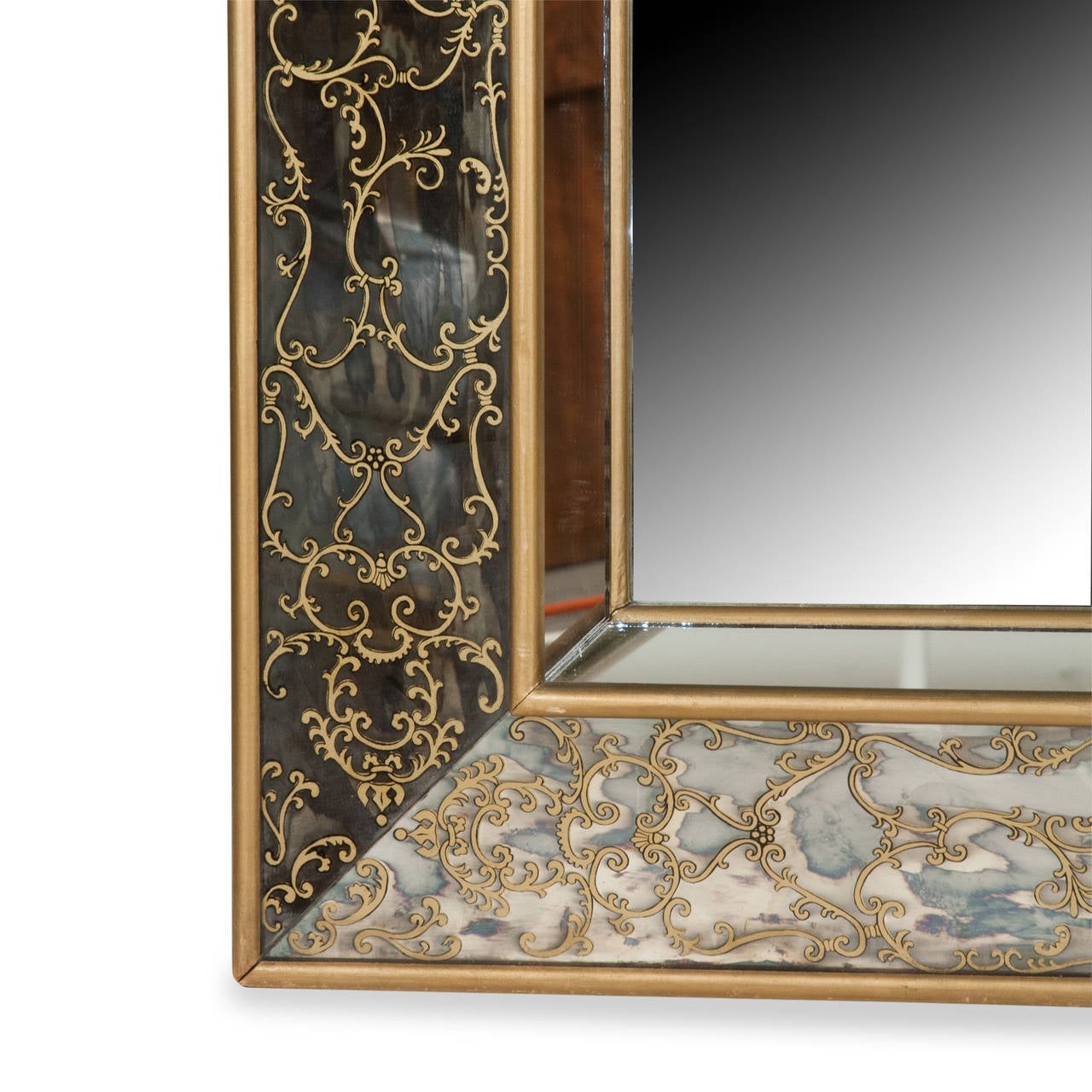 Large paneled wall mirror, of rectangular form. The central mirror surrounded by reverse painted mirror border, with giltwood frame and borders, American, 1960s. Measures: 60 in x 48 in, depth 3 in. width of outer panel 5 in. Interior mirror