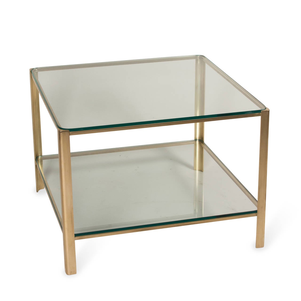 Brass frame square coffee table, glass top with rounded corners, lower glass shelf, by Maison Malabert, French, 1940s. Stamped markings to inside edge. Attributed to Jacques Quinet. Measures: 24 in square, height 17 in.