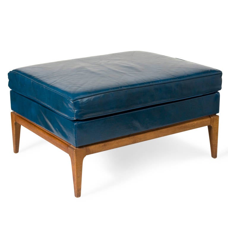 Slate blue leather upholstered poplar frame ottoman, rectanguar form with loose top seat cushion, by T.H. Robsjohn-Gibbings, American early 1960s. In original upholstery, with faintest signs of use. 28 x 23 in, height 15 in. (Item #1643)