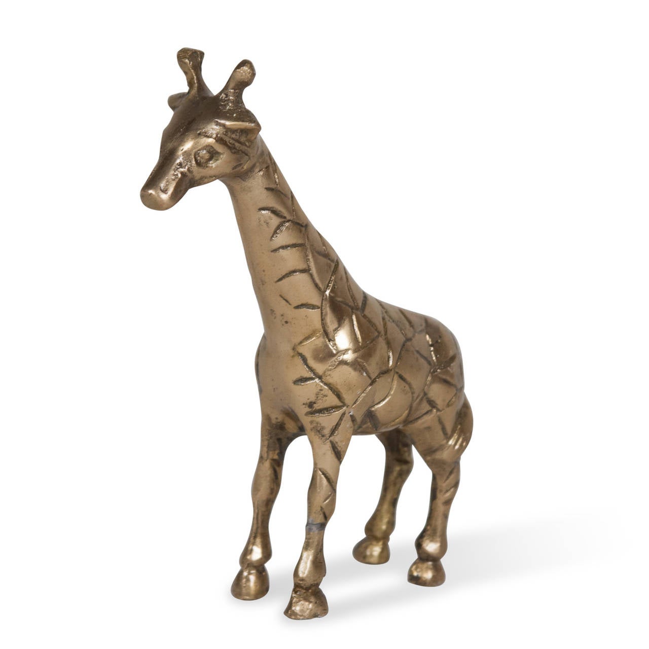 Bronze giraffe sculpture, American 1970s. Height 5 1/2 in, length 4 1/2 in, width 1 1/2 in. (Item #2361)