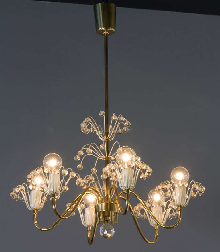 Six arm brass, enameled metal and crystal chandelier, the sockets with flower form decoration on the sockets and on the rod. By Emil Stejnar for Nikoll, Austrian 1960s. Diameter 21 in, height 29 in. (Item #1691)