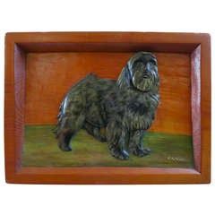 Carved Plaque of a Terrier