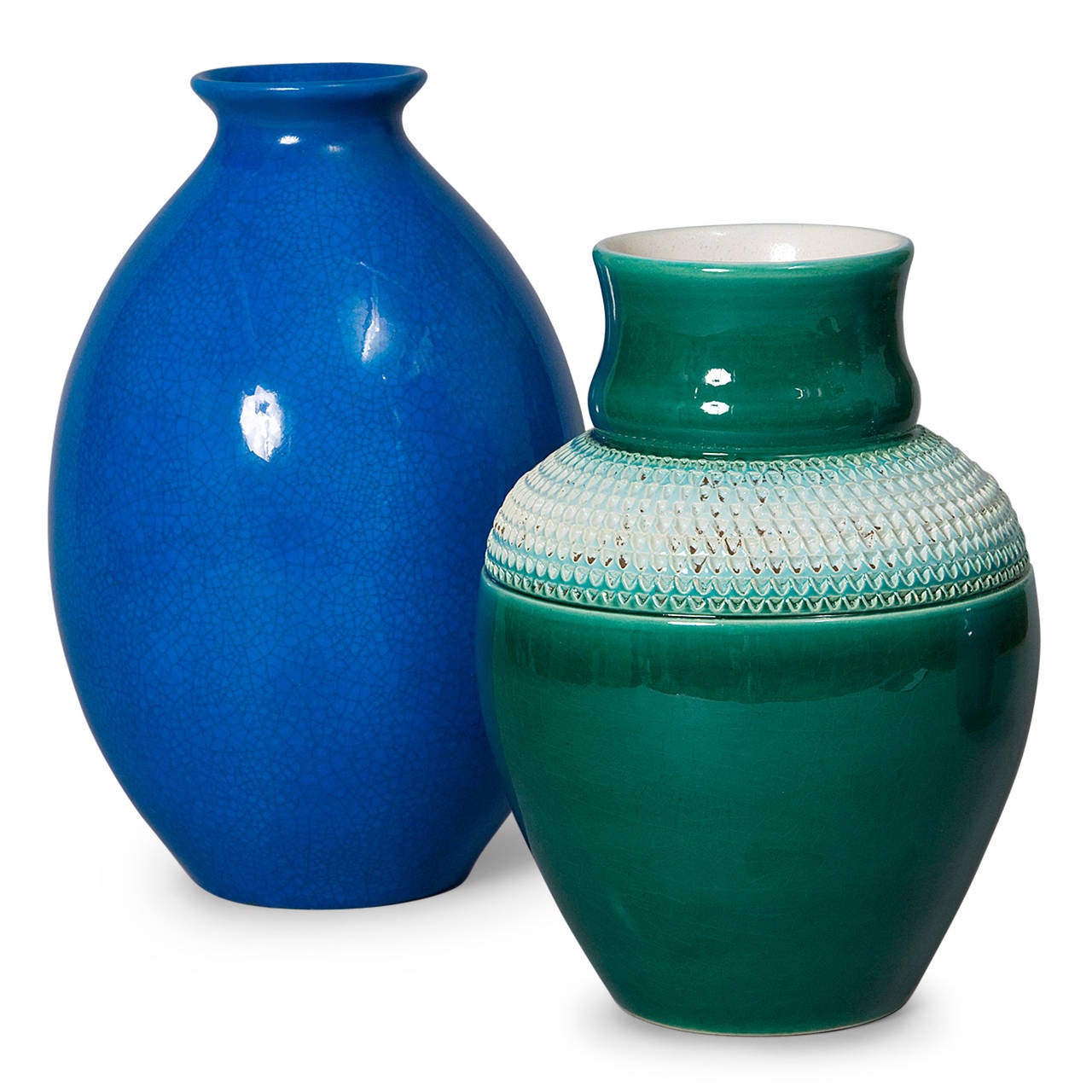 Two ceramic vases, sold together or separately.:
Tall blue crackle glaze vase, ovoid form with pulled rim, by Boch La Louviere Keramis, Belgian 1930s. Signed to underside. Height 12 in, diameter 7 3/4 in. (Item #1376)
Green ceramic vase having