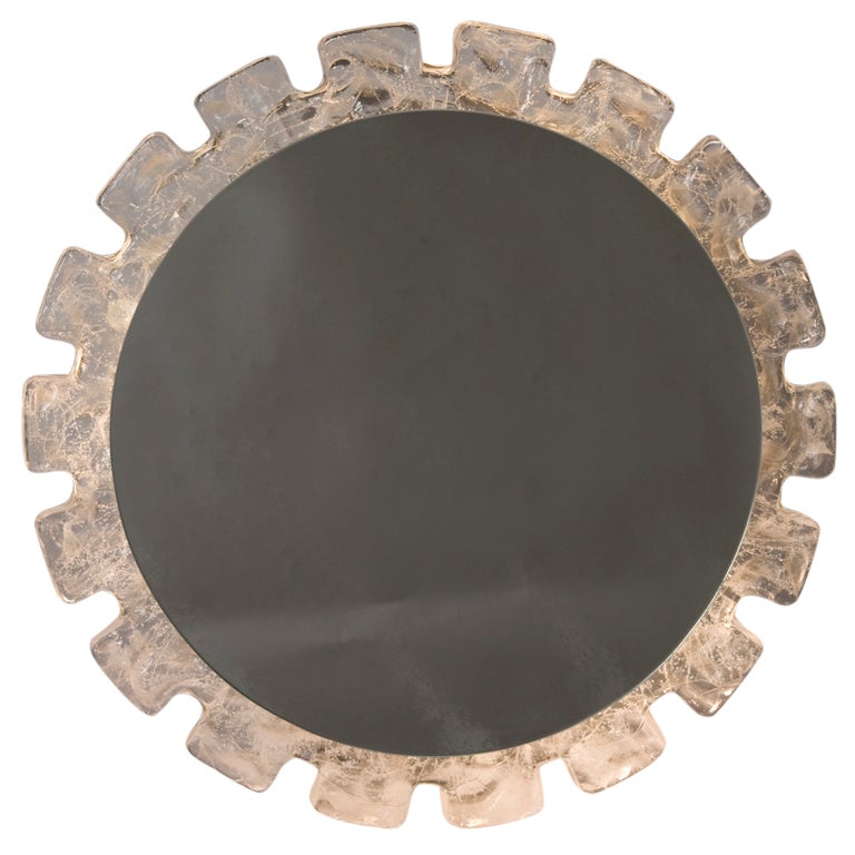 Clear resin/perspex frame circular form illuminated mirror, textured frame with deep sawtooth edge German, 1970s. Diameter 18 in, depth 2 3/4 in. (Item #1661)