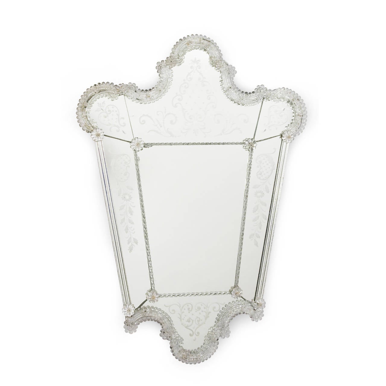 Clear and silvered glass frame mirror, with glass florets applied to braided rope form frame, outer panels etched with foliate decoration, central panel having smaller rope border and florets at each corner, the overall shape an V-Form with rounded