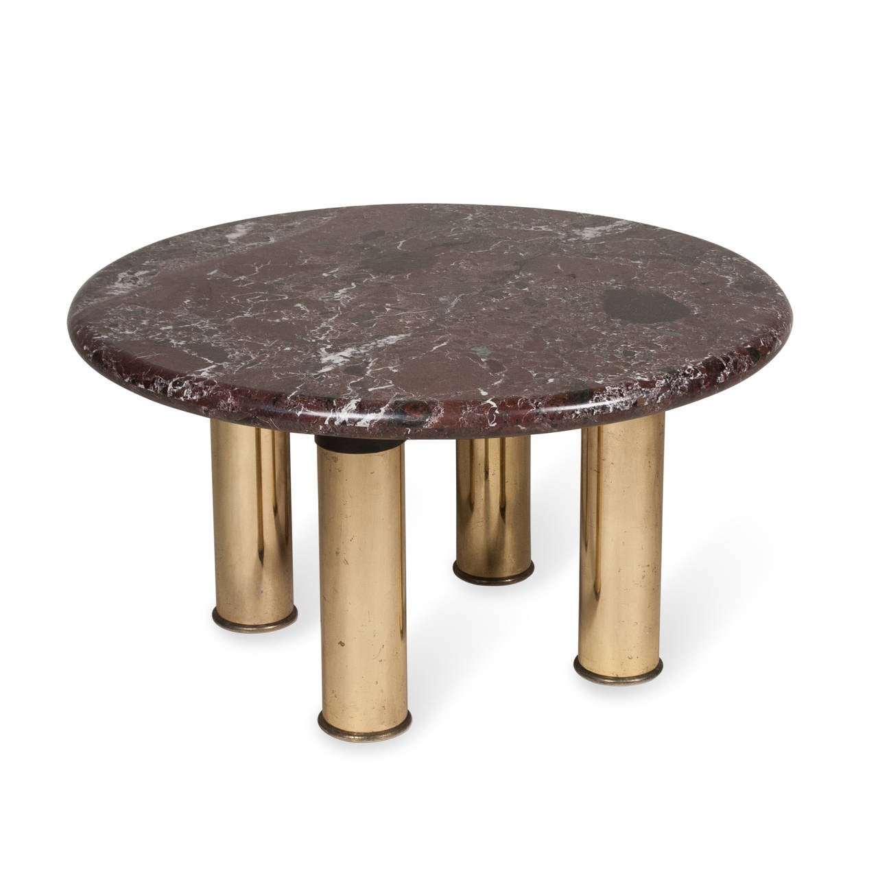 Marble circular end or side table, rounded edge, the marble mounted on four cylindrical lacquered brass legs, American, 1980s. Diameter 30 in, height 16 1/2 in. (Item #2262)