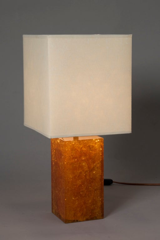 Fractal crackle orange resin square column table lamp, with square parchment colored paper shade, by Pierre Giraudon, French circa 1970. Overall height 17 3/4 in. Shade measures 8 in square, height of shade 9 in. base is 4 in square. (Item #1560)