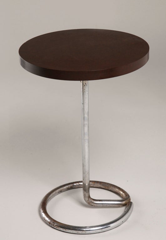 Chrome steel tubular occasional table with bakelite circular top, by Stablet, attributed to Rene Herbst, French 1930s. Height 19 in, diameter 13 1/4 in. (Item #1045)