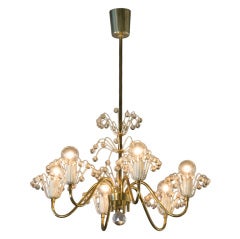 Six Arm Brass and Crystal "Fountain" Chandelier by Stejnar