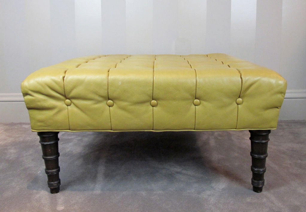 A very rare bench or ottoman form from Dunbar and designed by Edward Wormley.  All-original condition, including tufted leather upholstery.  Retains D metal tag.