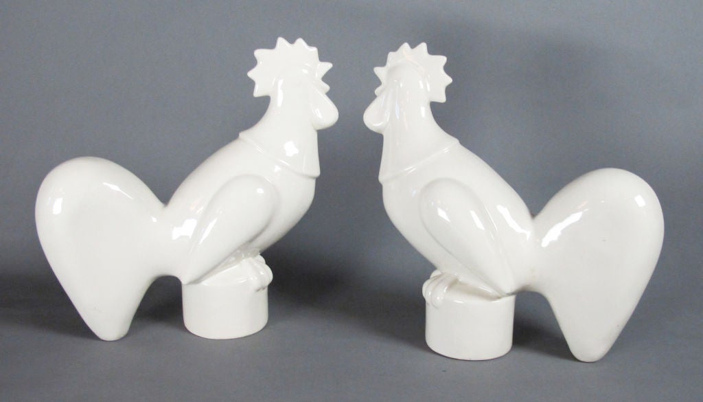 A large pair of decorative rooster figures designed by Waylande Gregory. Unsigned, but unquestionably his design. Figures vary by one half inch in height--measurements reflect largest rooster. Priced as pair.