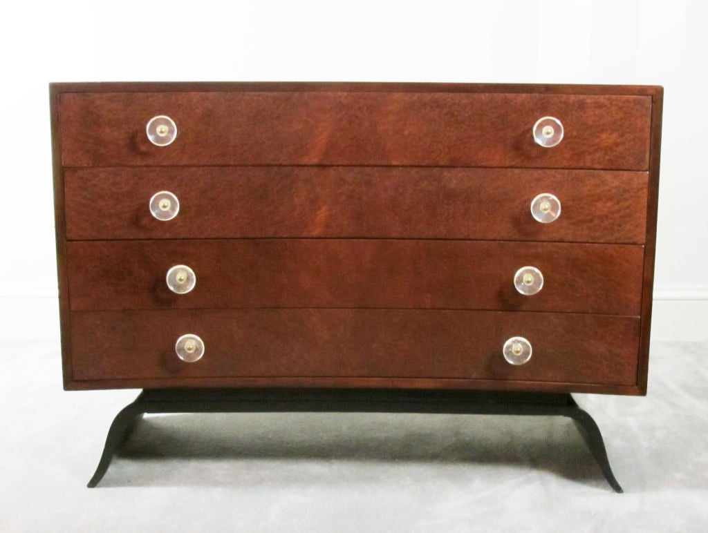 A beautiful dresser or low chest designed by Gilbert Rohde for Herman Miller, circa 1939. Made of East Indian rosewood and sequoia burl, this is from one of Rohde's most elegant bedroom collections.