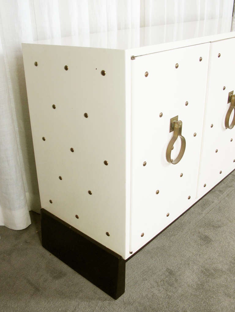 Mid-Century Modern Studded Sideboard by Tommi Parzinger For Sale