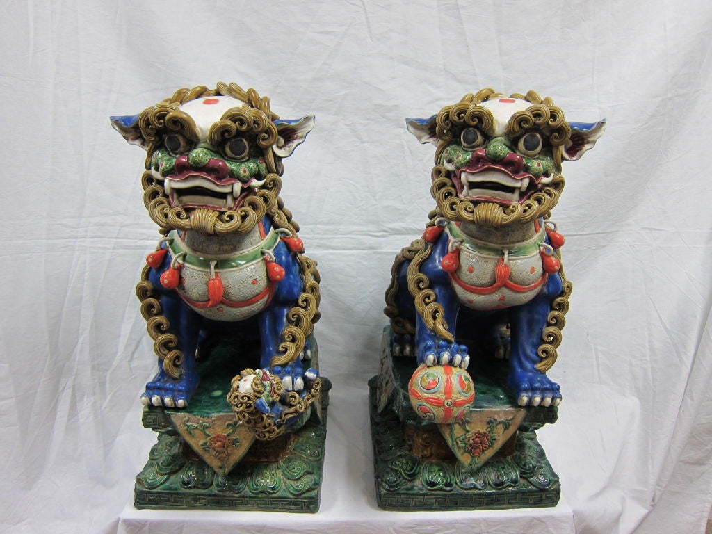 Chinese Ceramic Foo Dogs early 20th century Fusan handwork ceramics.  Chop marks on back Fusan. Beautifly vibrant colors and excellent handwork.<br />
Priced as a set.