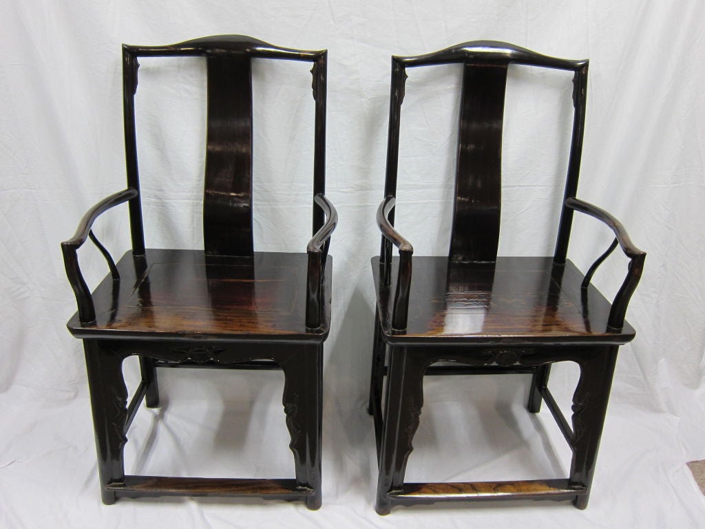 19th Century Southern Officials Hat Armchairs, carved lower apron with spandrels on three sides.<br />
Priced as a pair.