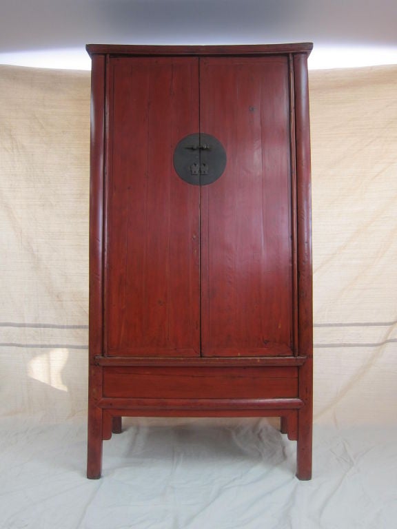 A 19th century Monumental Chinese Tapered Dressing Cabinet red lacquer over Cedar wood.  CA1870
