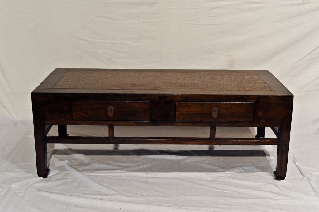 Oriental coffee table with four drawers.