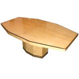Dinning hoctogonal shapped fom table, and parchment top cover.