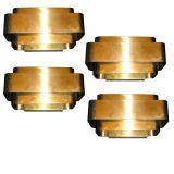 A set of 4 sconces by jules wabbes