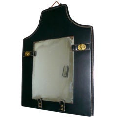 A mirror by jacques adnet