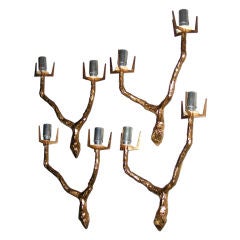 A set of 4 sconces by "ARLUS"