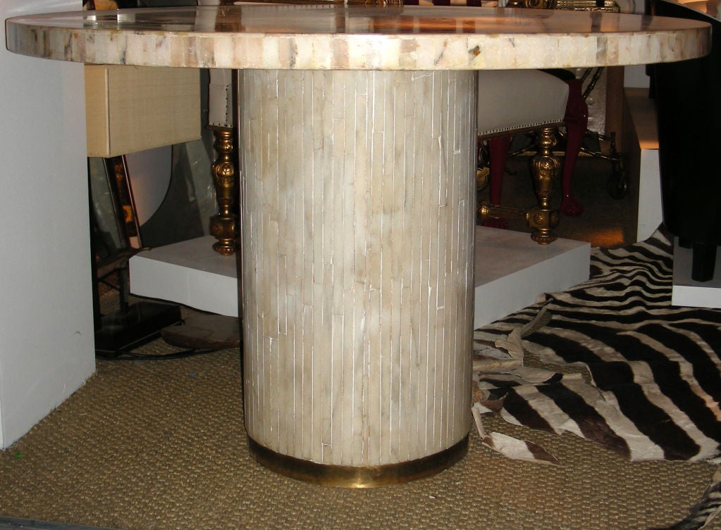 AN INLAID MARBLE TABLE BY VAN HEVEL