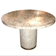 AN INLAID MARBLE TABLE BY VAN HEVEL