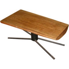 A coffee table atributed to CARL AUBOCK