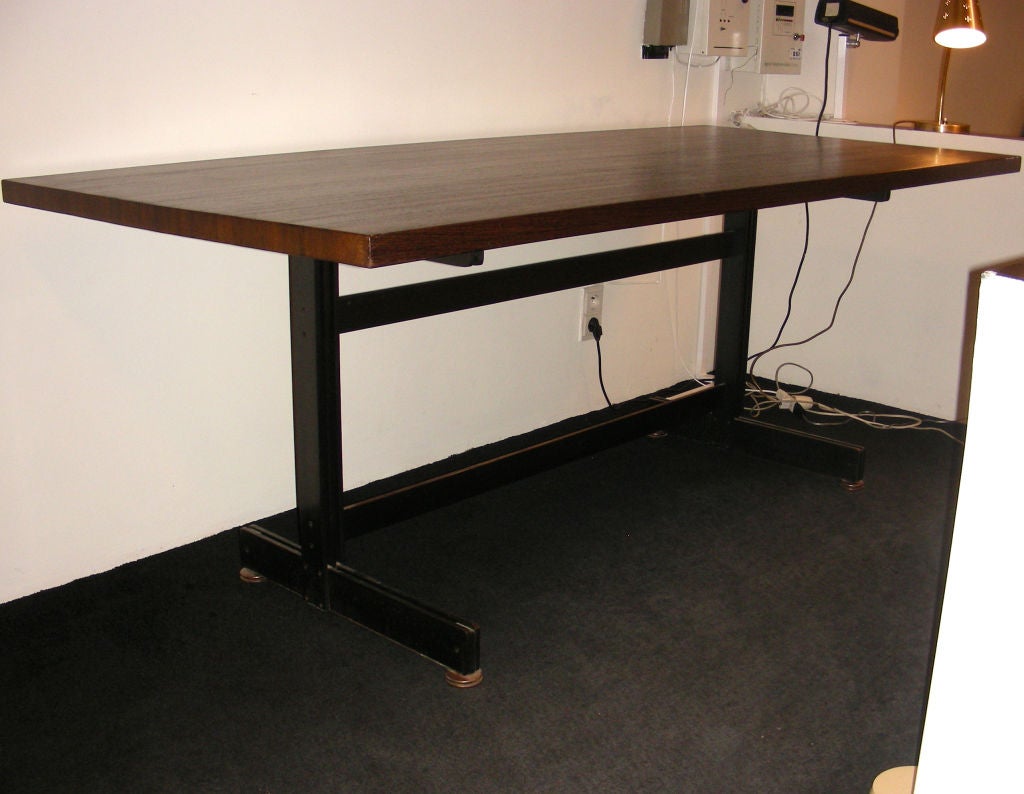 A Jules Wabbes Dinning Table With A Bronze Finish