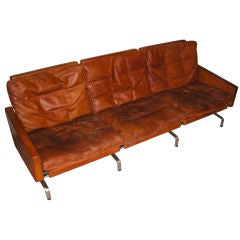A THREE SEAT ORIGINAL EDITION SOFA BY KJAERHOLM