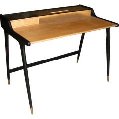 A  1950 desk  in the manner of Raphael