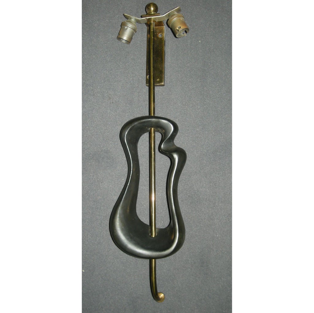 A pair of Georges Jouve sconces
