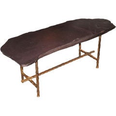 Coffee table in gilt metal and Stone plateau