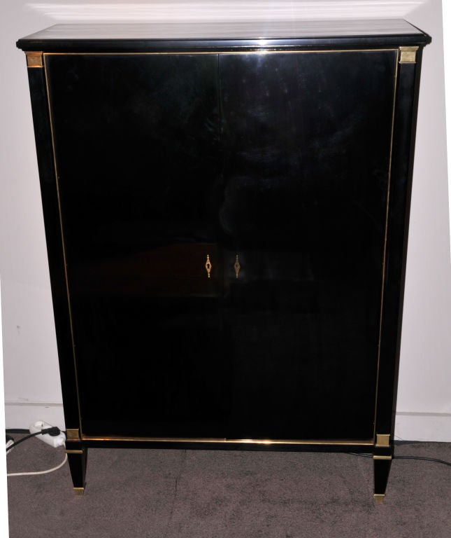 black lacquered buffet dry bar<br />
inside blond wood