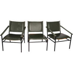 Armchairs by Jacques Adnet