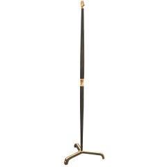 A floor lamp by Jacques Adnet