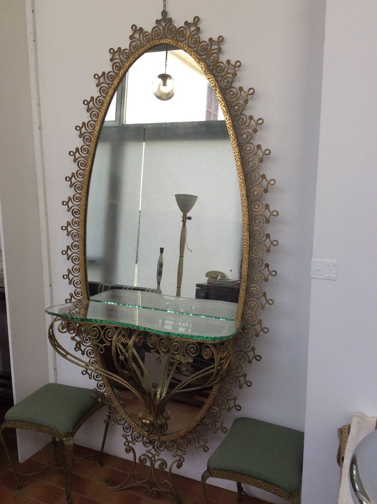 Italian gilt-metal console table and mirror by Pier Luigi Colli c. 1950's / 1960's
 1950's / 1960's, a monumental mirror having 