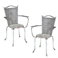 Pair of chairs atributed to JEAN ROYERE