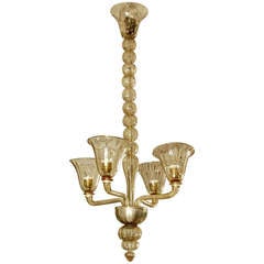 Chandelier in Murano glass with four branches.
