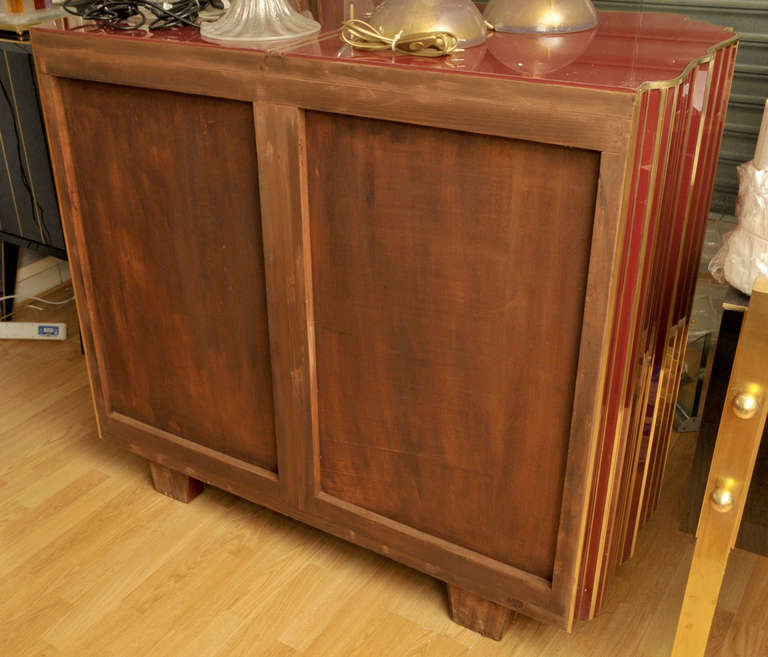 Pair of buffets all in mirror, two doors, alternation of thin metal sticks. 1