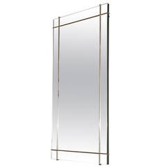 Mirror Divided by Brass
