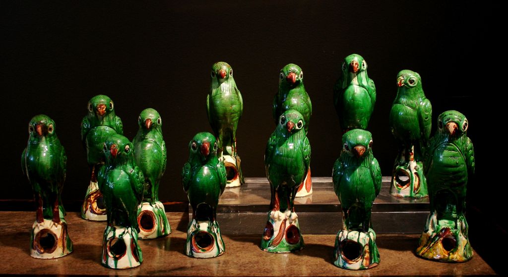 From a prominent New York collection, this flock was obviously lovingly assembled over a period of many years. <br />
<br />
The parrots are all individually molded, with additional incised details. Each one is portrayed on a simulated pierced