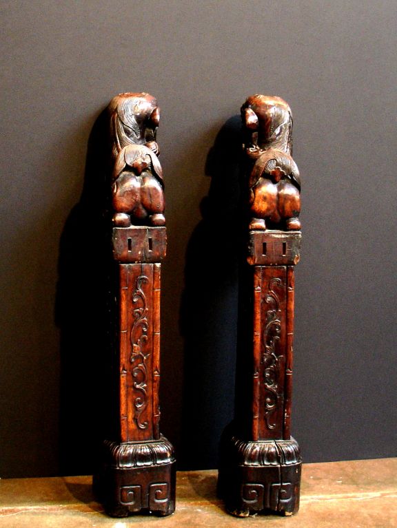 A Pair of Carved Rosewood Foo Lions 2