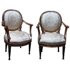 A Pair of Carved Italian Open Armchairs