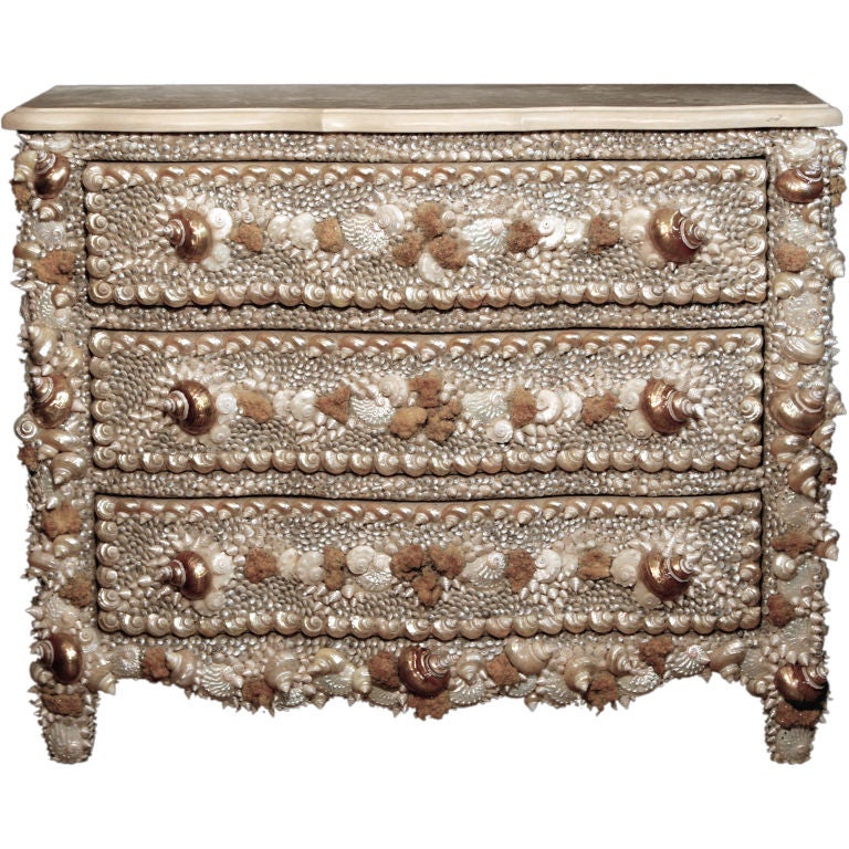 A Shell And Mineral Encrusted Commode