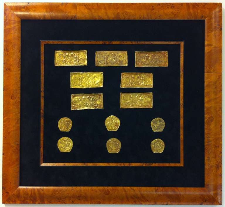 A group of thirteen Ordos Culture gold repousse plaques. Originally intended as clothing ornaments, these highly detailed plaques feature various motifs, such as ibexes, dragons, bulls, humans, insects and celestial objects all grouped in an