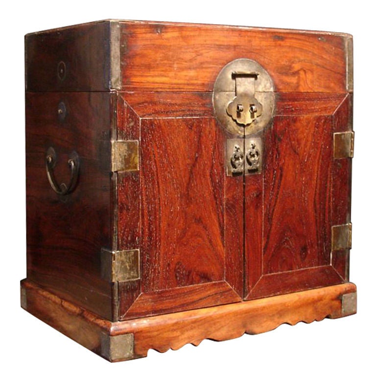 A fine and large huanghuali scholar's table top chest, guanpixiang. <br />
<br />
Originally used to store various seals, personal implements, and treasured objects. The hinged top lifts back, exposing a shallow compartment. The two doors, with