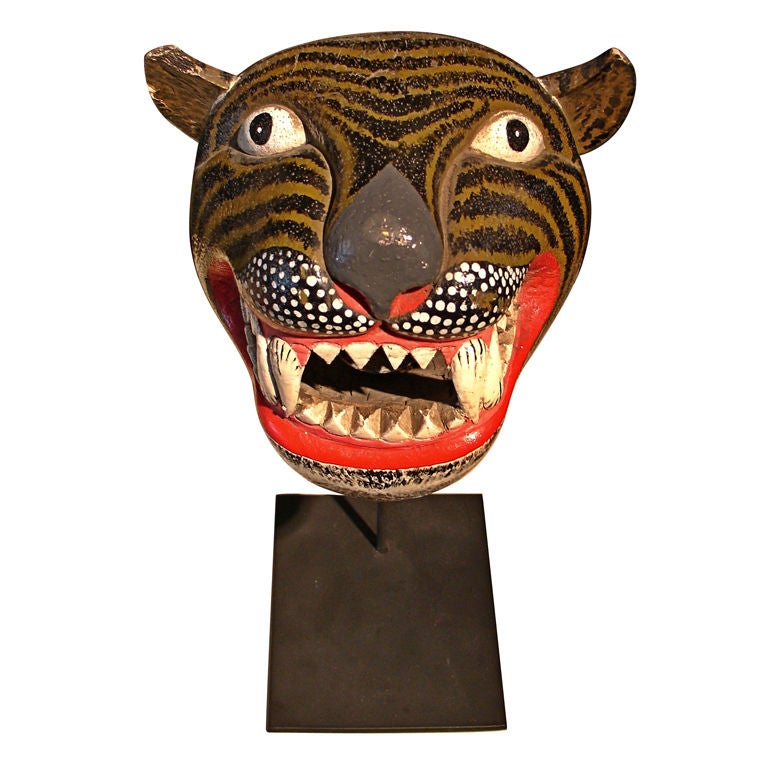 An Indonesian Carved and Painted Tiger Mask