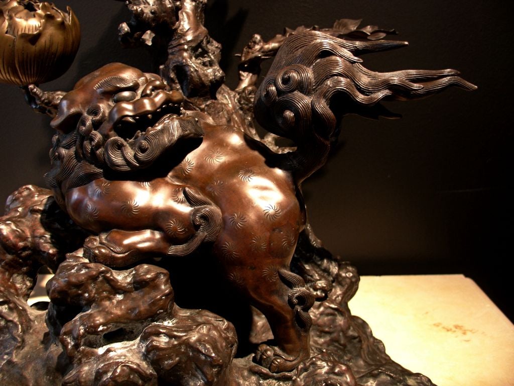 A Japanese Bronze Shishi Lion FormTemple Candle Holder 1