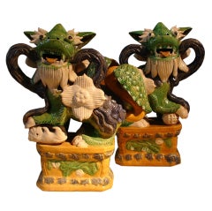 A Pair of Chinese Glazed Shiwan Pottery Foo Dogs
